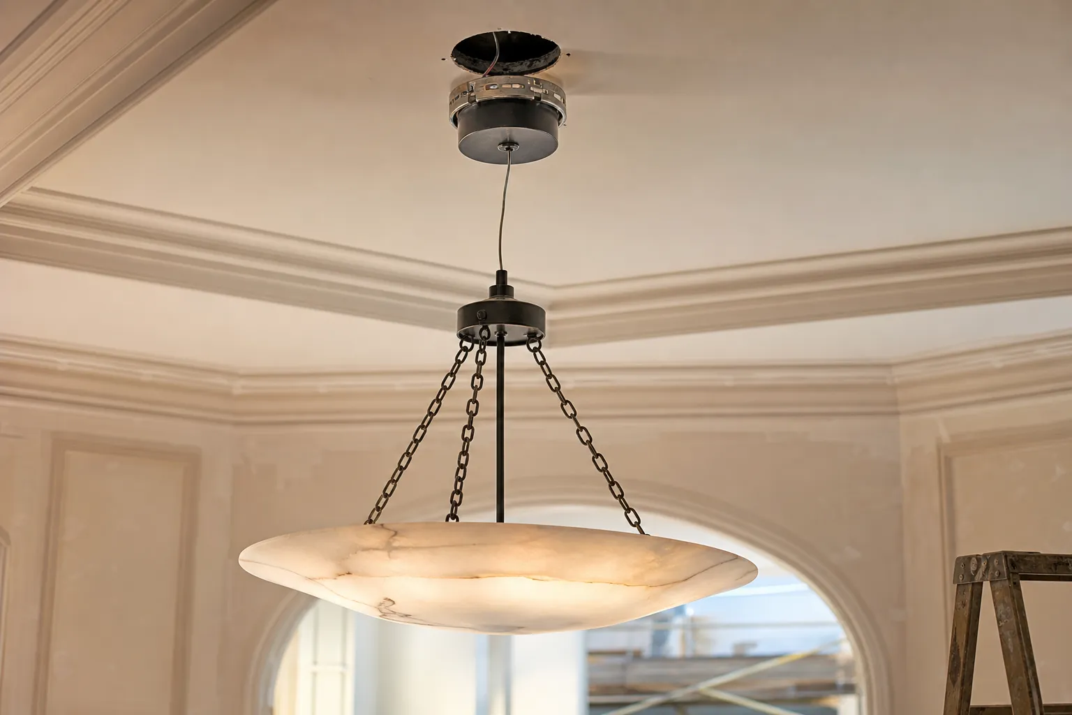 Detail of chandelier installation in progress